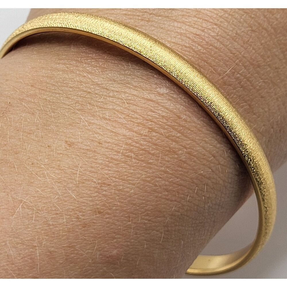 Monet Etched Goldtone Bangle Bracelet 7.5in
